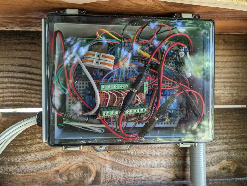 Junction box with all the circuit-related things mentioned earlier inside. It looks very chaotic, lots of wires going all over the place