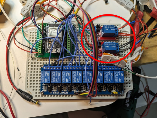 The whole sprinkler circuit with the top right corner of two relays circled in red